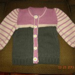 Pink-Cream-Green striped sweater, front view